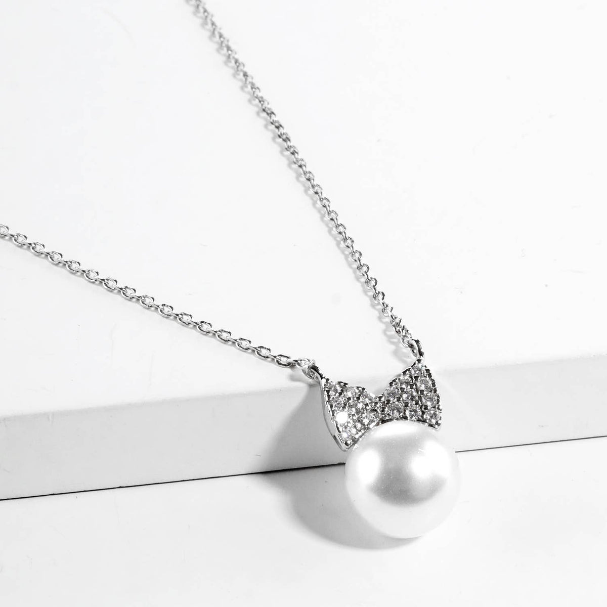 Elegant Bow & Pearl Pendant Necklace