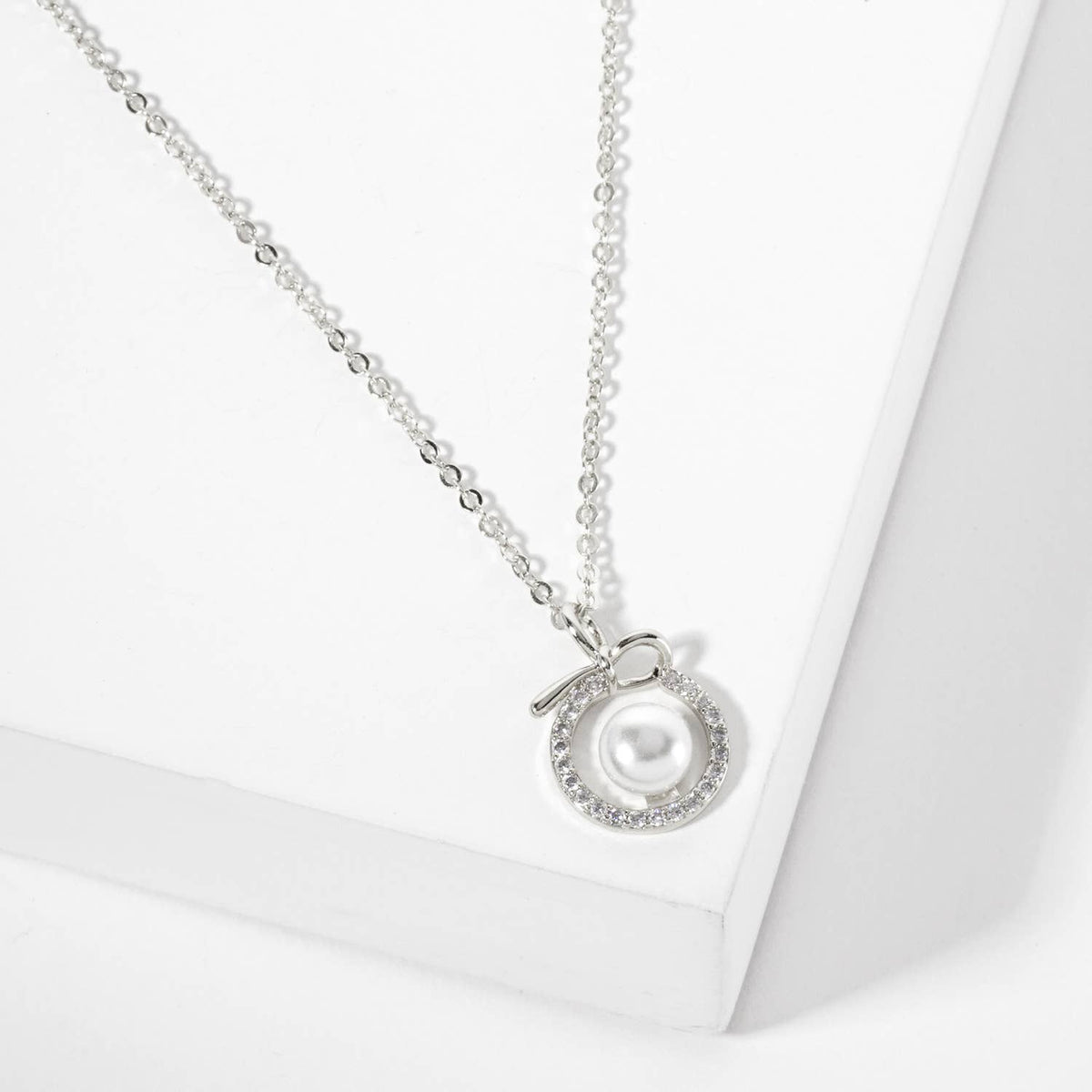 Center Pearl Point Pave-Set Circle Bow Pendant Necklace
